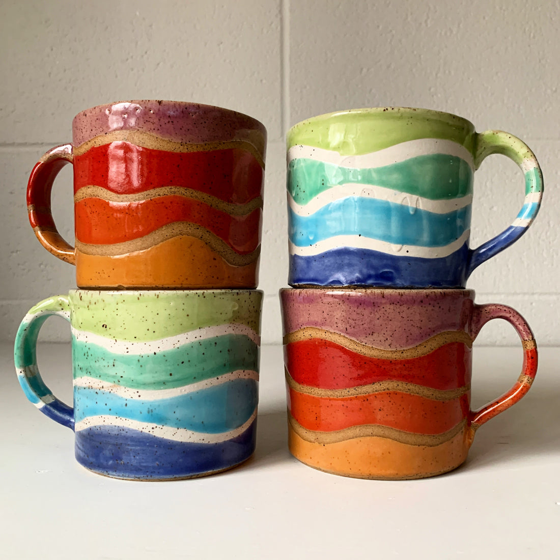 colorful stoneware mugs